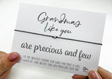 a person holding a card with a message on it