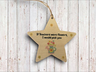 a wooden star ornament with a quote on it