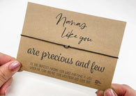 a person holding a card with a message on it