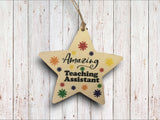 a wooden star ornament hanging on a wooden wall