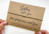 a person holding a card with a message on it