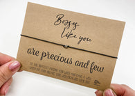 a person holding a card with a message on it